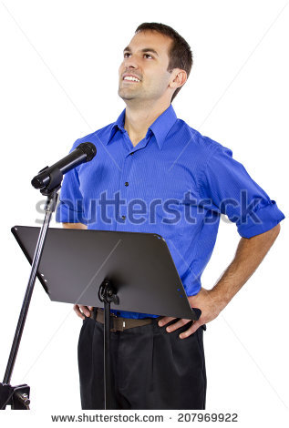 stock-photo-businessman-on-a-podium-making-a-speech-or-announcement-207969922